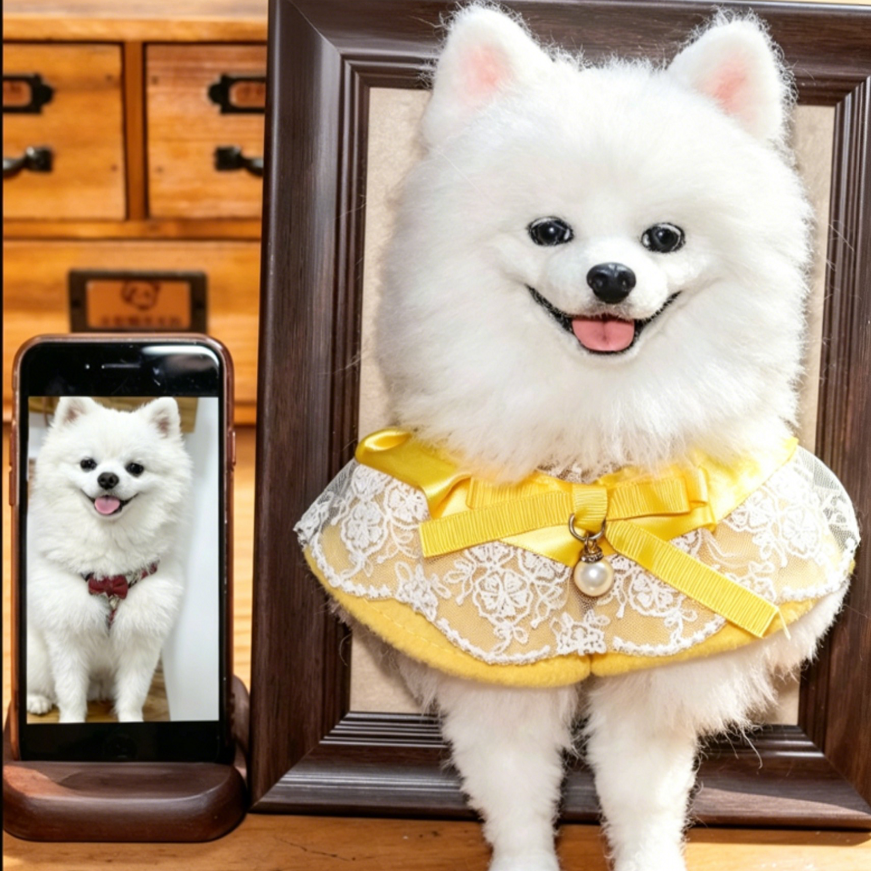 Hyper-realistic custom white dog wool felt replica in a wooden frame next to original photo - Everfurl